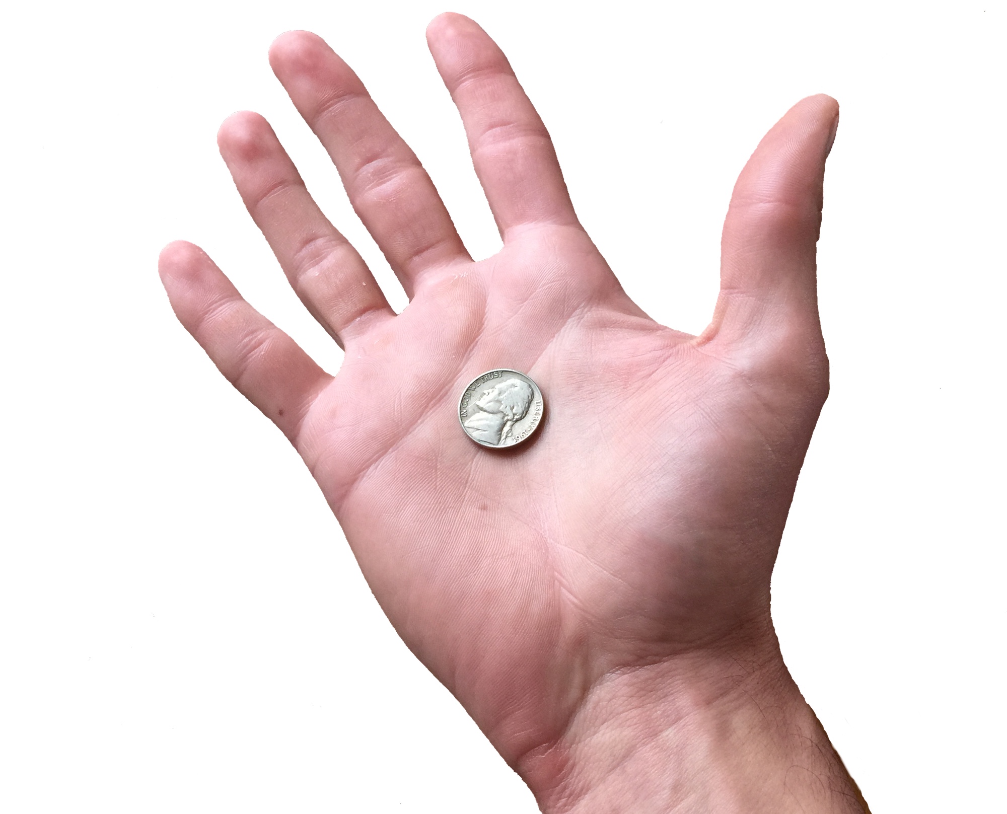 A nickel in the palm of a hand